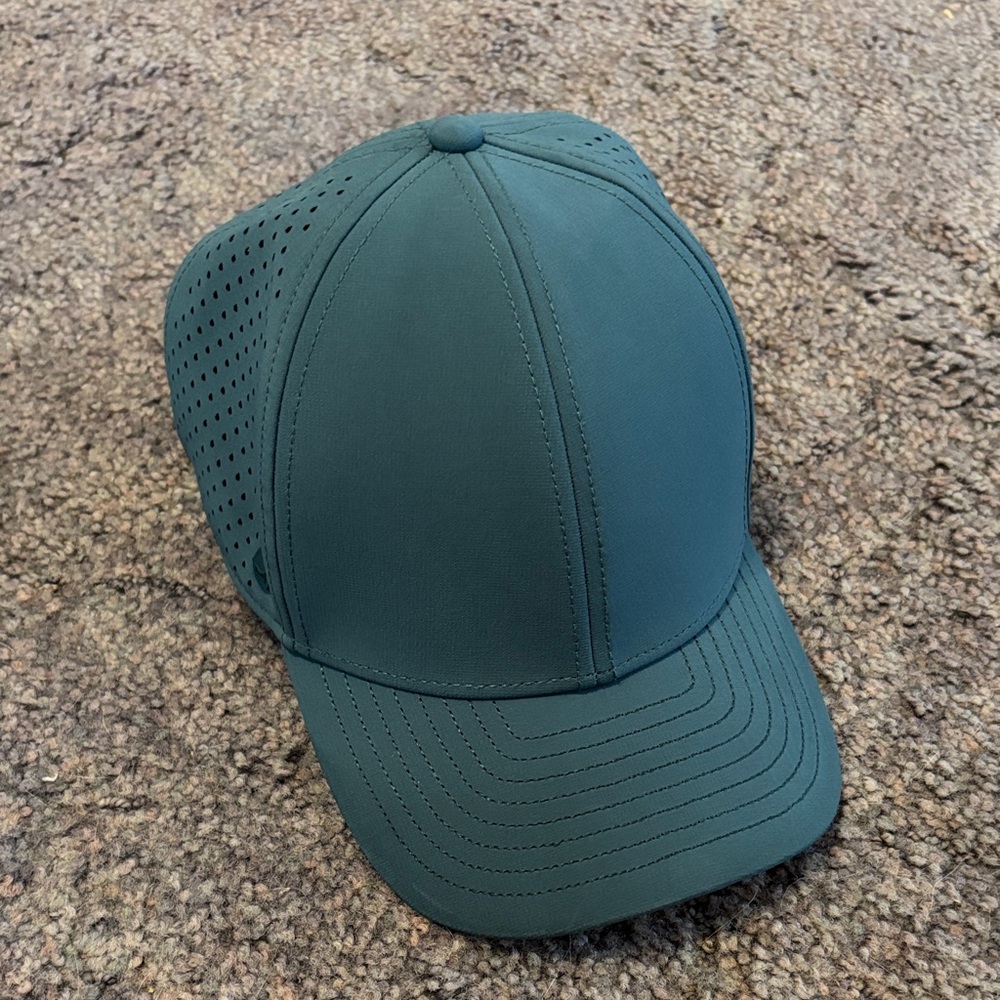Melin A-Game Hydro 58cm phtalo green snapback hat